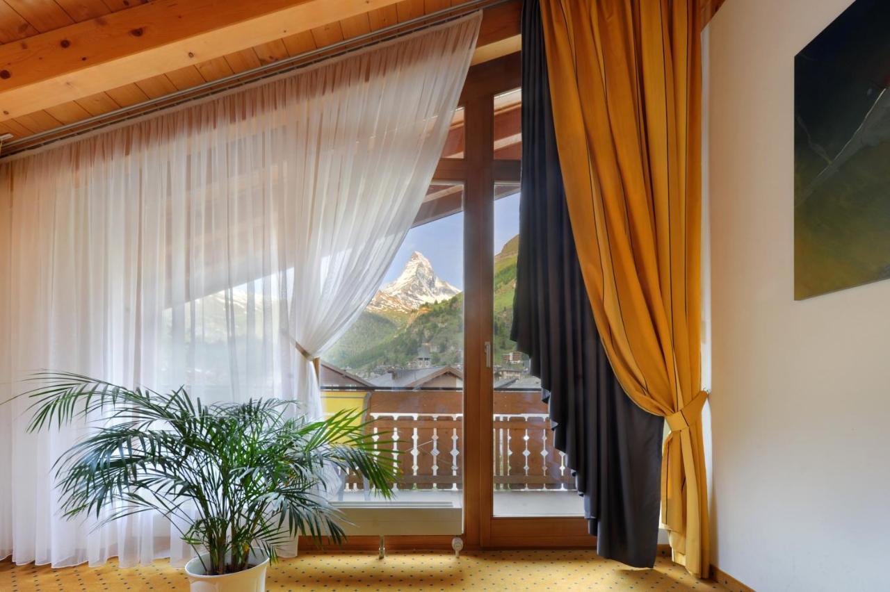 Alpine Hotel Perren Zermatt Rom bilde